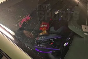 Bouknight’s picture before being arrested: unconscious, with glock in his lap and bag of Doritos