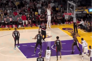 Jusuf Nurkic turns his back on Anthony Davis shooting a 3 that hits corner of backboard